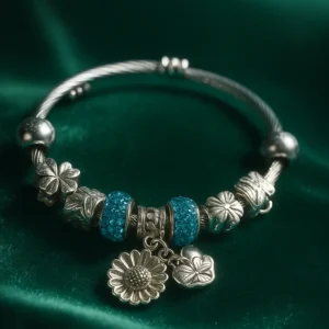 Blue Crystal Silver Charm Bracelet with Daisy Pendant – Close-up