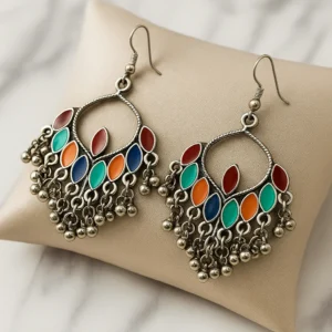 Close-up of dangling beads on multicolor oxidized bohemian jhumka earrings