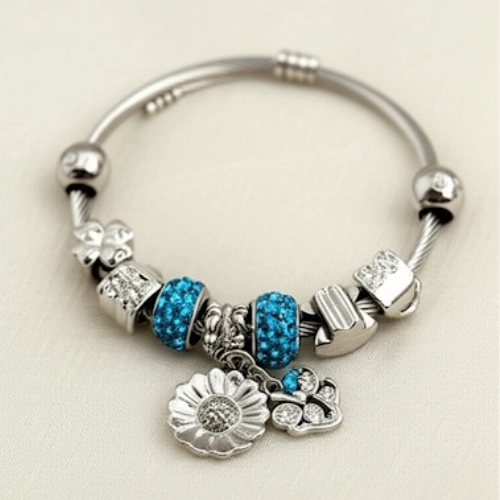 Full View of Silver Charm Bracelet with Blue Beads & Daisy Pendant