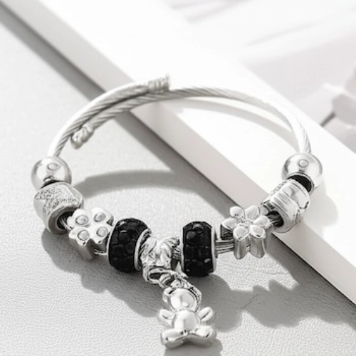 eddy Bear Charm Silver Bracelet Full view of Teddy Bear Charm Silver Bracelet with beads and floral accents