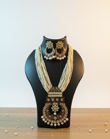 Kundan pearl earrings with meenakari work and pearl drops