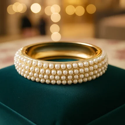 Elegant pearl studded artificial gold bracelet close-up | Designer party wear kada bangle for women